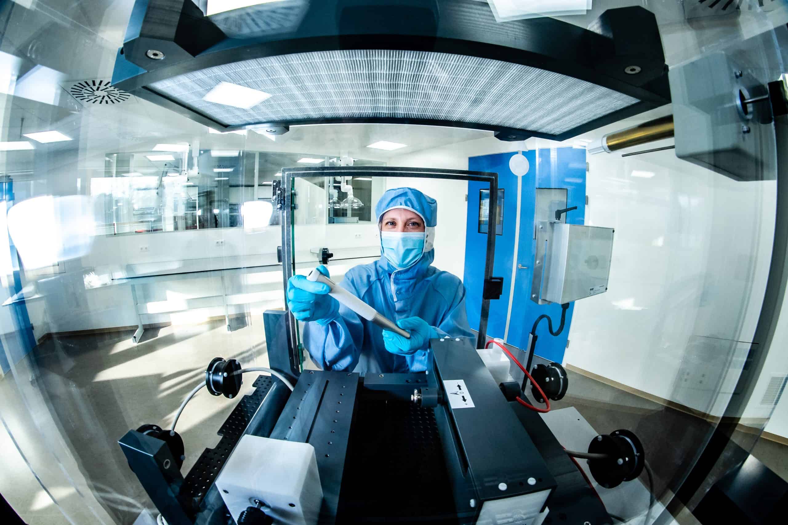 Electrospinning scientist showing electrospinning CDMO services and products
